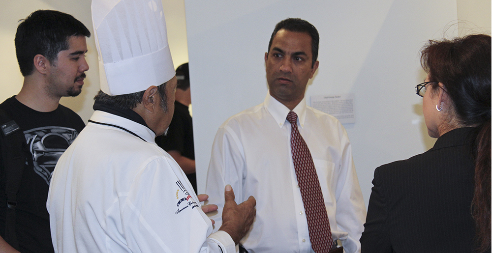 Photo of Chef Tucker talking with crowd