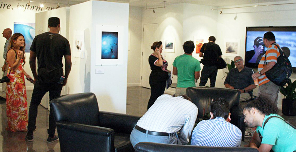 Photo of crowd viewing art