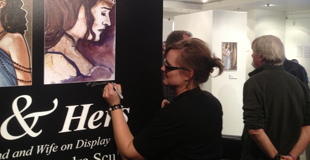 Photo of Kandra signing art